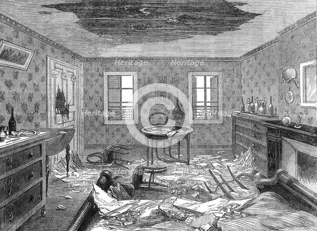 Bombardment of Paris: effects of a shell bursting in the third storey of a house, 1871. Creator: Unknown.