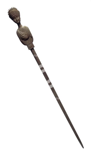 Bone hairpin in the form of a woman, Roman, (late 1st century AD?). Creator: Unknown.