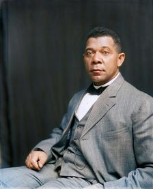 Booker T. Washington, half-length portrait, seated, c1895. Creator: Frances Benjamin Johnston