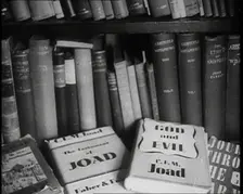 Books on a Bookshelf, 1930s. Creator: British Pathe Ltd