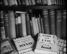Books on a Bookshelf, 1930s. Creator: British Pathe Ltd