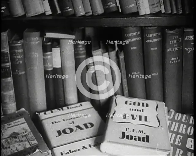 Books on a Bookshelf, 1930s. Creator: British Pathe Ltd.