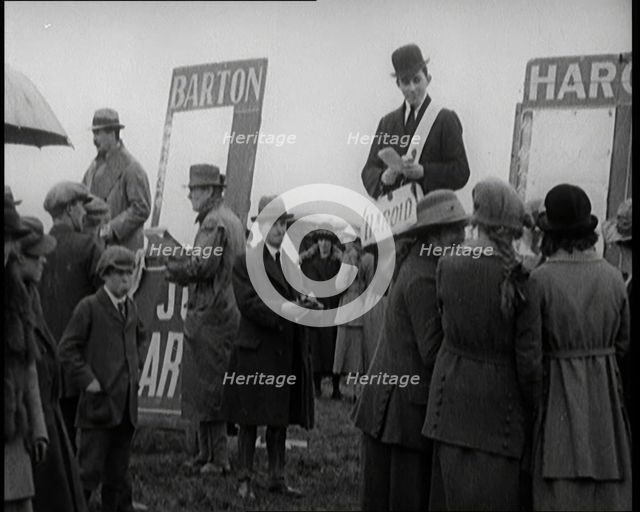 Book Makers 'Barton' and 'Arnold' Taking Bets at a Horse Race in Southern Ireland, United..., 1921. Creator: British Pathe Ltd.