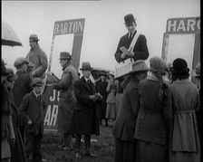 Book Makers Barton and Arnold Taking Bets at a Horse Race in Southern Ireland, United..., 1921. Creator: British Pathe Ltd
