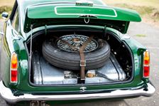 Boot and spare wheel of a 1961 Aston Martin DB4 GT previously owned by Donald Campbell. Creator: Unknown