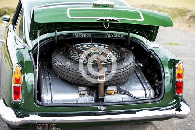 Boot and spare wheel of a 1961 Aston Martin DB4 GT previously owned by Donald Campbell. Creator: Unknown.