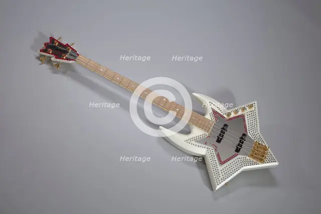 Bootsy Collins Space Bass guitar owned by Bootsy Collins, July 2002. Creator: Washburn Guitars.