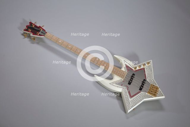 Bootsy Collins Space Bass guitar owned by Bootsy Collins, July 2002. Creator: Washburn Guitars.