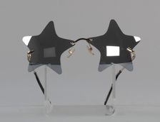 Bootsy Collins style star-shaped mirrored lens sunglasses, 1993-2013. Creator: elope, inc.