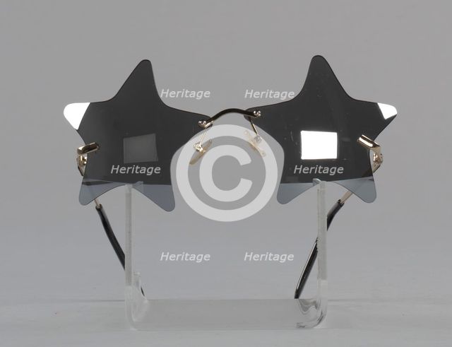 Bootsy Collins style star-shaped mirrored lens sunglasses, 1993-2013. Creator: elope, inc..