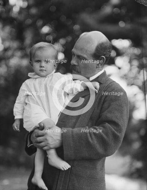 Borglum, Gutzon, Mr., and child, outdoors, 1917 Aug. 18. Creator: Arnold Genthe.