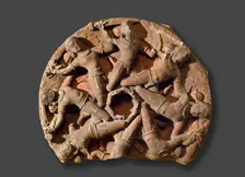 Boss from a temple ceiling with circle of flying warriors, late 8th century-early 9th century
