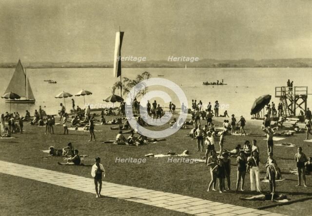 Bathers on the shores of Lake Constance, Bregenz, Austria, c1935. Creator: Unknown.