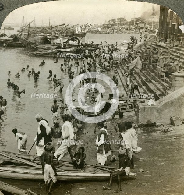Bathing at a Ghat on the Ganges, Calcutta, India, c1900s(?).Artist: Underwood & Underwood