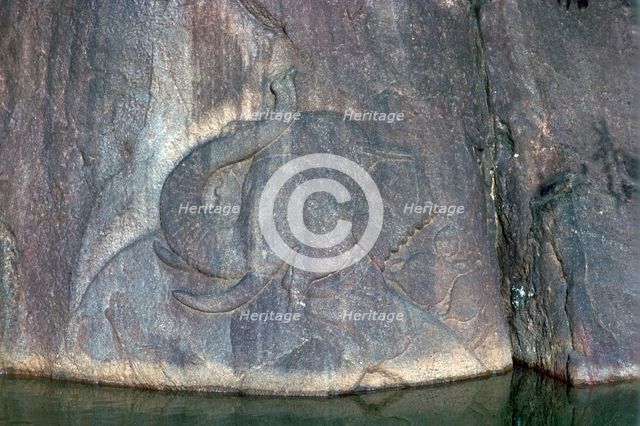 Bathing elephant carved in low relief in a Buddhist shrine. Artist: Unknown