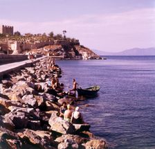 Bathing from the causeway, Kusadasi, Turkey, c1955. Creator: Arthur Charles Kirby Ware