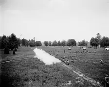 Battalion firing, kneeling, M[ichigan] M[ilitary] A[cademy], Orchard Lake, Michigan, c1900. Creator: Unknown