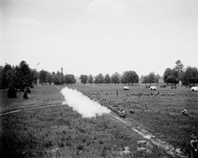 Battalion firing, kneeling, M[ichigan] M[ilitary] A[cademy], Orchard Lake, Michigan, c1900. Creator: Unknown
