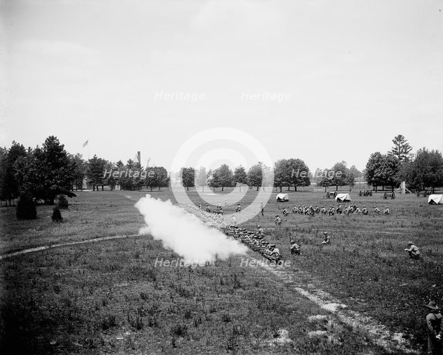 Battalion firing, kneeling, M[ichigan] M[ilitary] A[cademy], Orchard Lake, Michigan, c1900. Creator: Unknown.