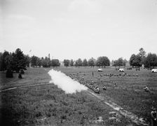 Battalion firing, kneeling, M[ichigan] M[ilitary] A[cademy], Orchard Lake, Michigan, c1900. Creator: Unknown