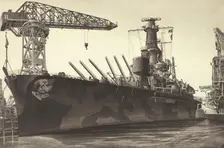 Battle Wagon - USS Alabama Outfitting at Norfolk Navy Yard Crane Ship Kearsarge Alongside, 1943. Creator: John Taylor Arms