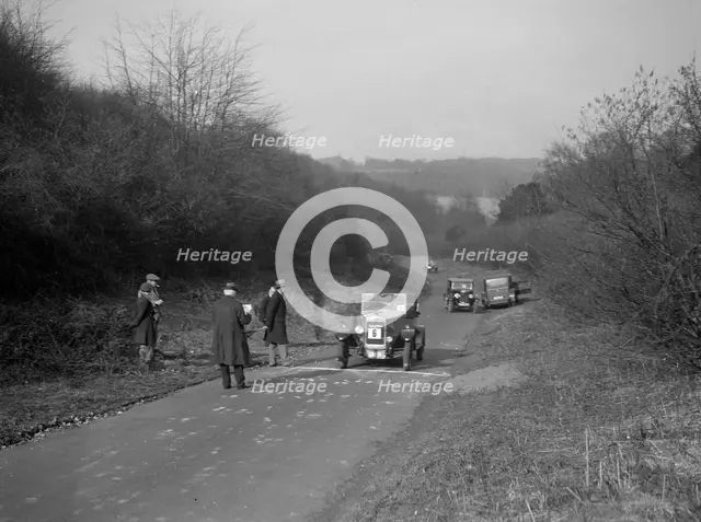Bayliss-Thomas of WJ Hayward, winner of the JCC Half-Day Trial, Ranmore Common, Surrey, 1930. Artist: Bill Brunell.