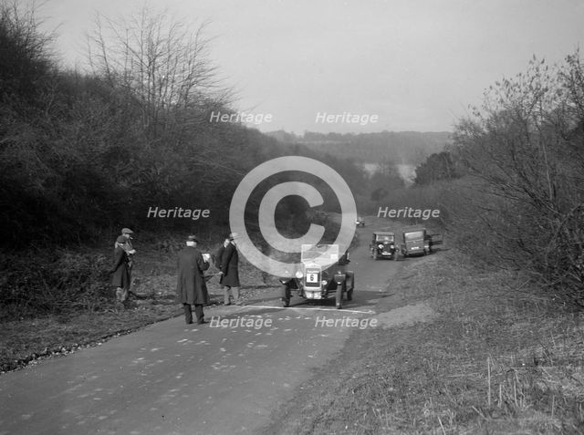 Bayliss-Thomas of WJ Hayward, winner of the JCC Half-Day Trial, Ranmore Common, Surrey, 1930. Artist: Bill Brunell.