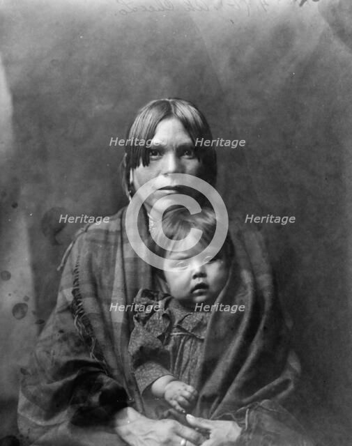 Babe and parent, c1905. Creator: Edward Sheriff Curtis.