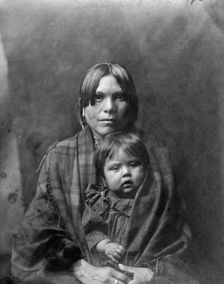 Babe and parent, c1905. Creator: Edward Sheriff Curtis