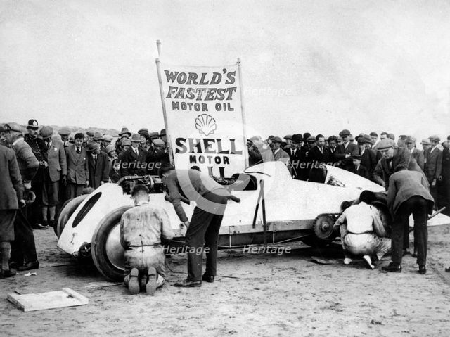 BABS with Parry Thomas, having wheel changed at Pendine sands 1926. Creator: Unknown.