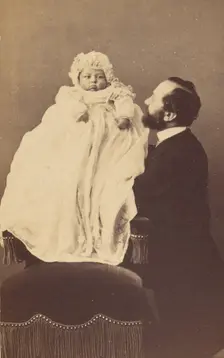 Baby in a bonnet and a long gown, about 1860. Creator: Desire Durand