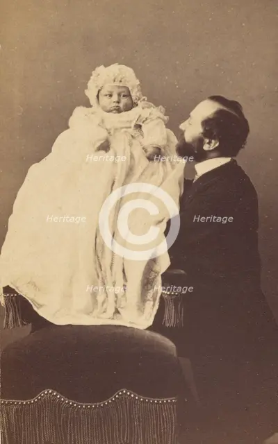 Baby in a bonnet and a long gown, about 1860. Creator: Desire Durand.