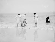 Baby's first lesson, between 1900 and 1905. Creator: Unknown