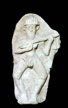 Babylonian terracotta figure of a male musician