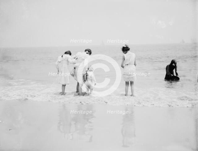 Baby's first lesson, between 1900 and 1905. Creator: Unknown.