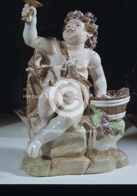 Bacchus, the Greek god of wine, ceramic figurine made in the Real Fábrica del Buen Retiro in 1775.
