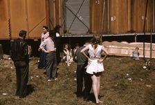 Backstage at the "girlie" show at the Vermont state fair, Rutland, 1941. Creator: Jack Delano