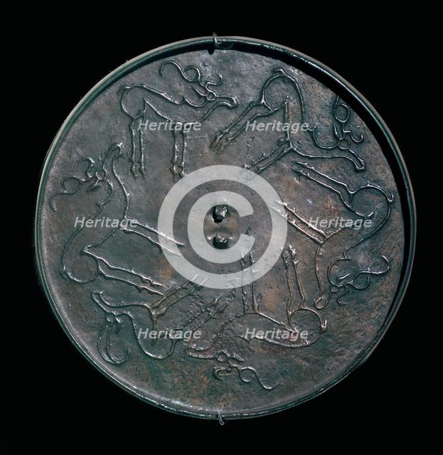 Back of an early Russian bronze mirror. Artist: Unknown
