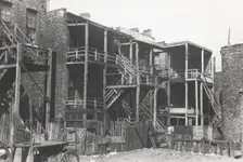 Back steps of apartments in Negro section of Chicago, Illinois, April 1941. Creators: Farm Security Administration, Russell Lee