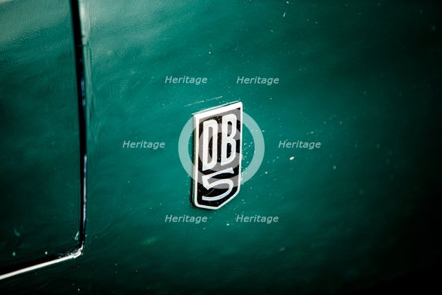 Badge of a 1965 Aston Martin DB5. Creator: Unknown.