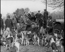 Badger Hunt. Huntsmen Gathering for Photographs With Their Dogs, 1921. Creator: British Pathe Ltd