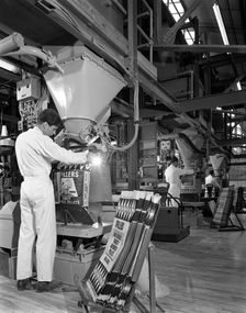 Bags being filled at the Spillers Animal Foods plant, Gainsborough, Lincolnshire, 1962. Artist: Michael Walters
