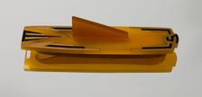 Bakelite case for nail buffer from dresser set owned by Lena Horne, mid 20th Century. Creator: Unknown