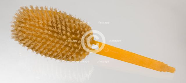 Bakelite hair brush from dresser set owned by Lena Horne, mid 20th Century. Creator: Agalin.