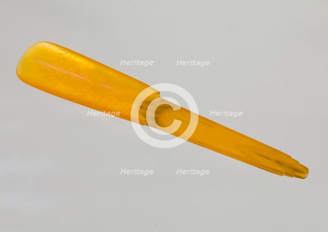 Bakelite shoe horn from dresser set owned by Lena Horne, mid 20th Century. Creator: Agalin.