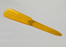 Bakelite shoe horn from dresser set owned by Lena Horne, mid 20th Century. Creator: Agalin