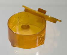 Bakelite powder box from dresser set owned by Lena Horne, mid 20th Century. Creator: Agalin