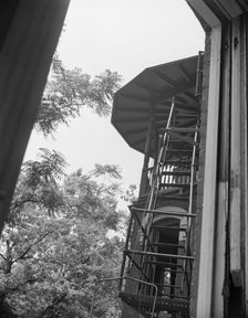 Balcony of house being wrecked on Independence Avenue, Washington, D.C, 1942. Creator: Gordon Parks