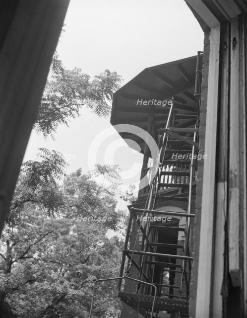 Balcony of house being wrecked on Independence Avenue, Washington, D.C, 1942. Creator: Gordon Parks.