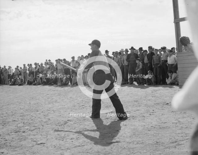Ball game, Shafter migrant camp, California, 1938. Creator: Dorothea Lange.